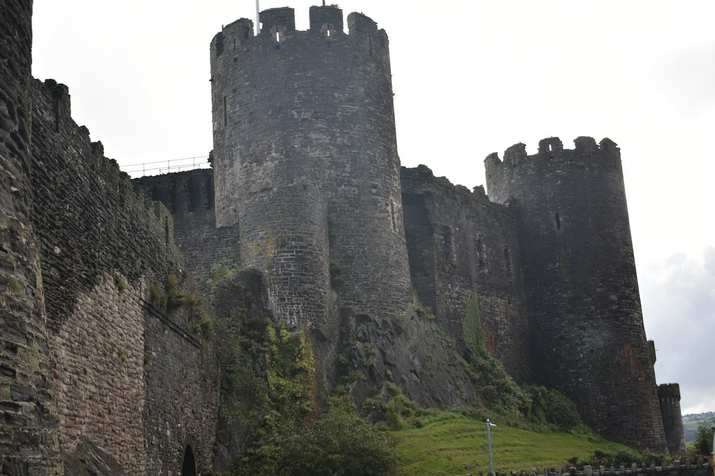 The medieval stone towers and walls of Conwy Castle in North Wales